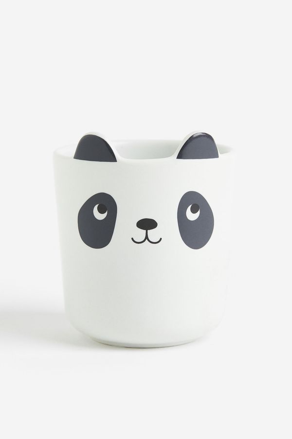 Taza de porcelana con motivo