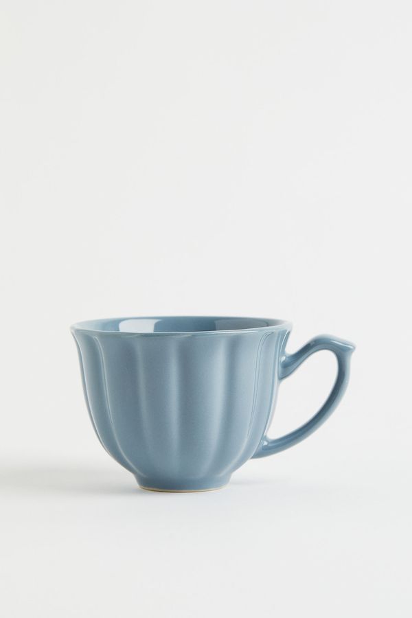 Taza pequeña de cerámica gres