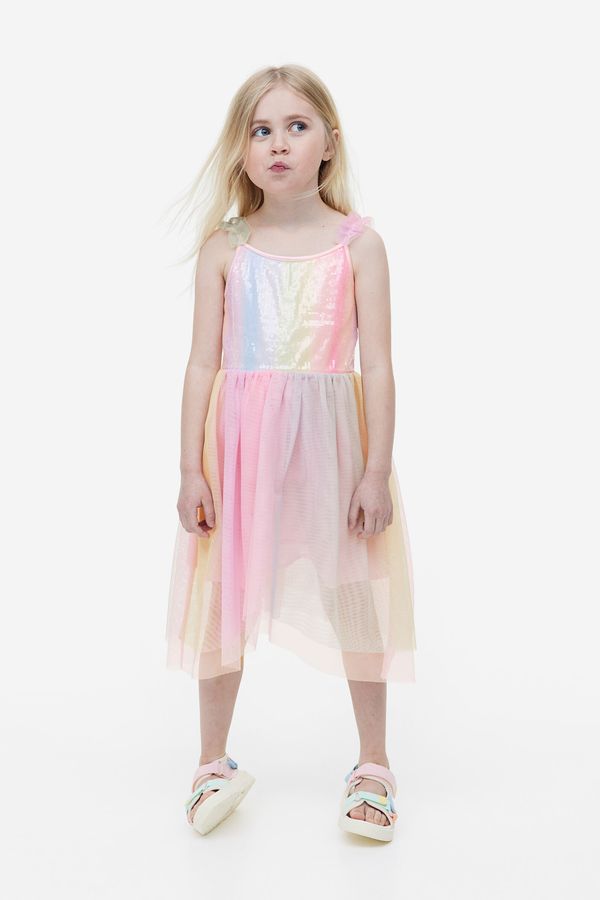 Vestido asimétrico con falda de tul
