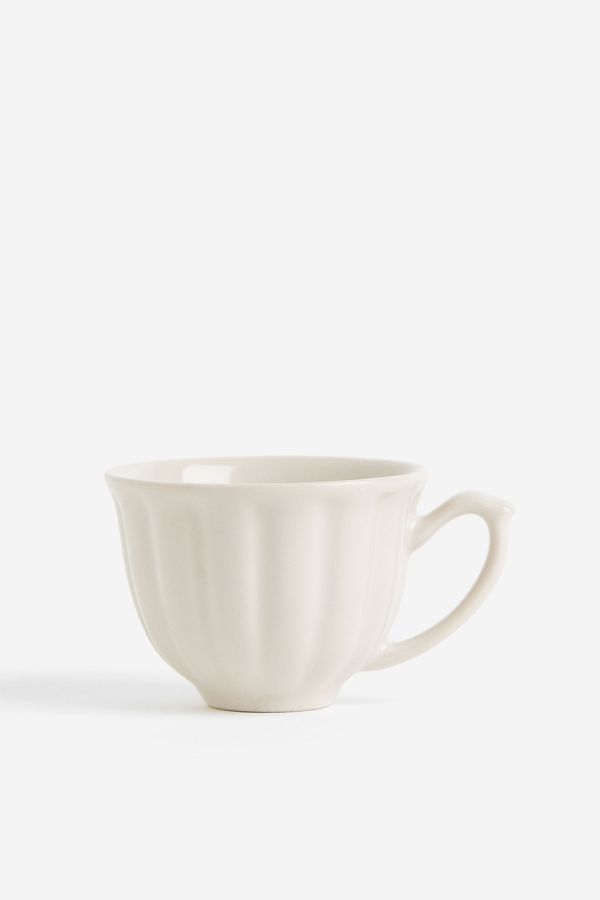 Taza pequeña de cerámica gres