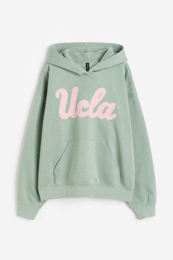 Polerón hoodie oversize con motivo estampado