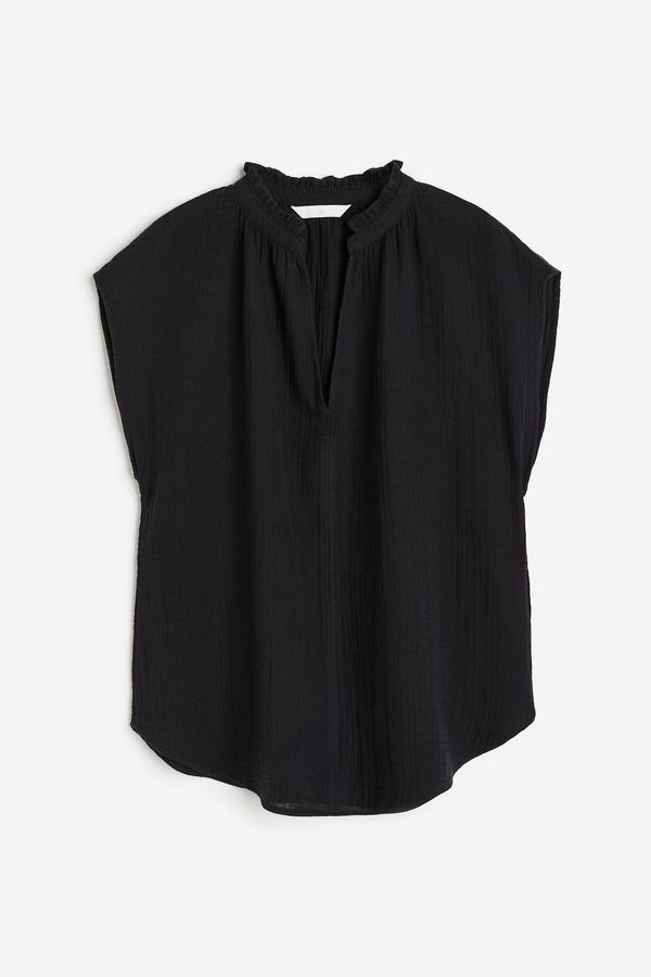 Blusa de algodón con ribete de vuelos
