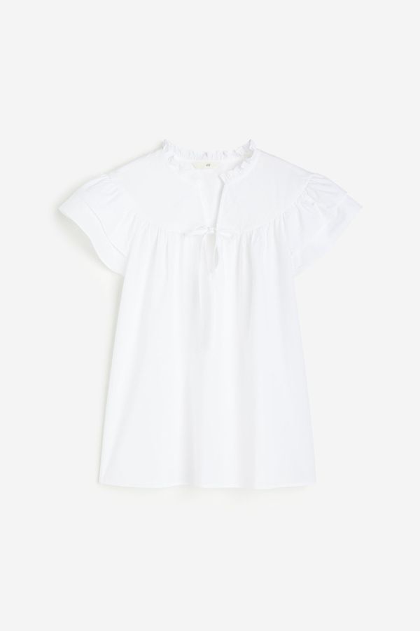 Blusa de popelina con mangas onduladas