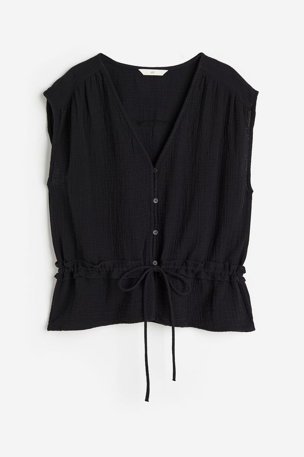 Blusa arrugada de algodón