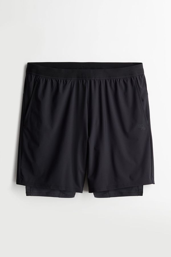 Shorts deportivo a media pierna 2 en 1 en DryMove™