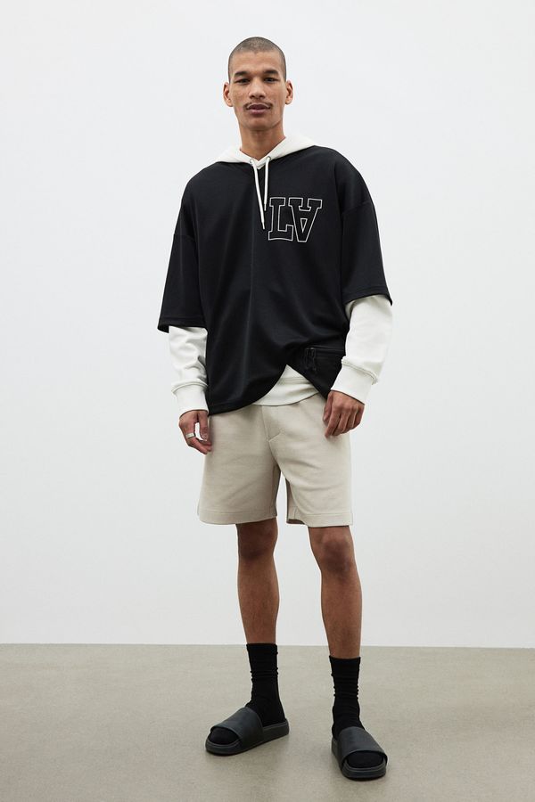 Polera de malla con estampado Oversized Fit