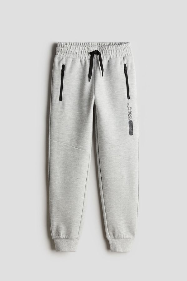 Joggers en punto pesado