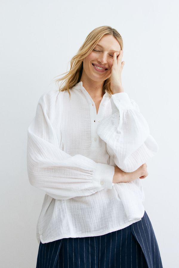 Blusa de muselina con mangas murciélago
