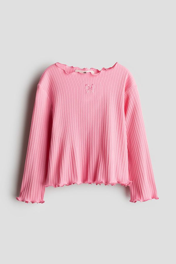 Top de algodón con detalles sobrehilados