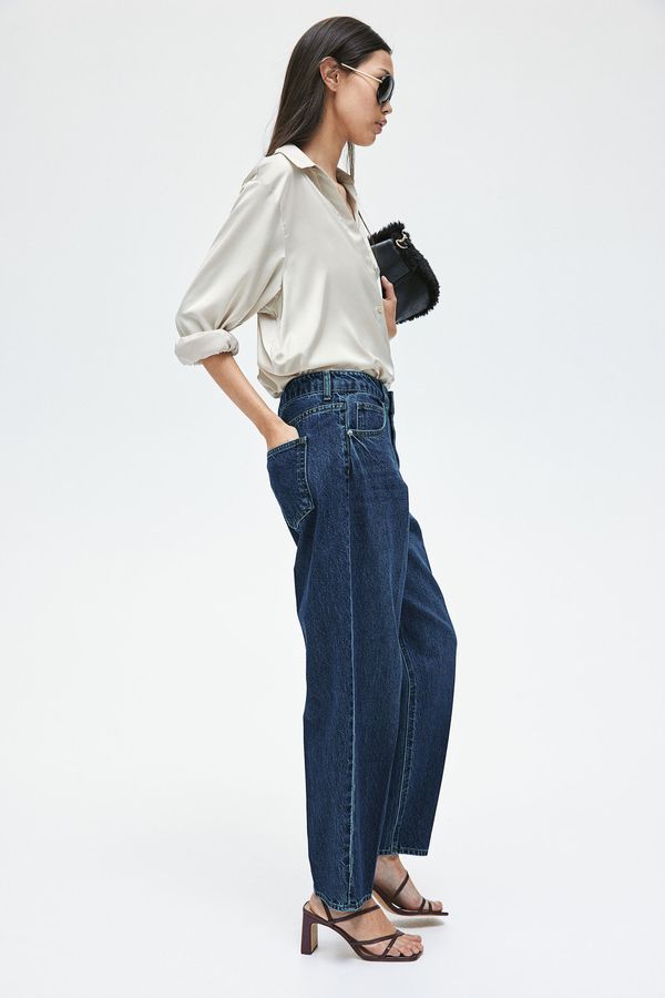 Jeans cónicos con raya