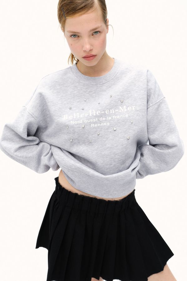 Polerón oversize con motivo estampado