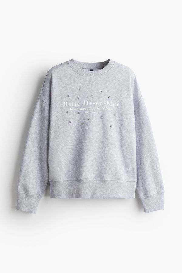 Polerón oversize con motivo estampado