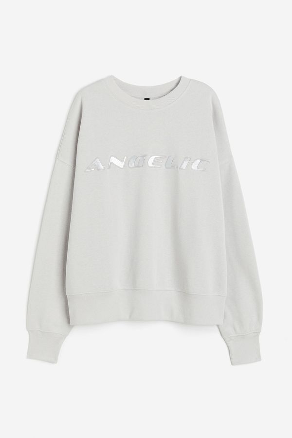 Polerón oversize con motivo estampado