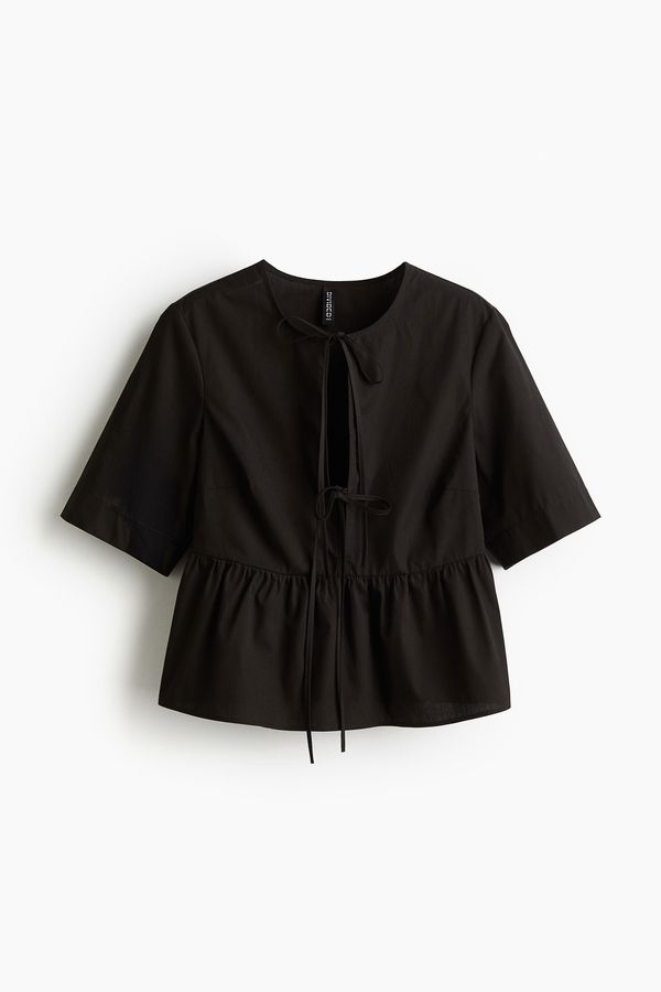 Blusa de popelina con tiras en la parte delantera