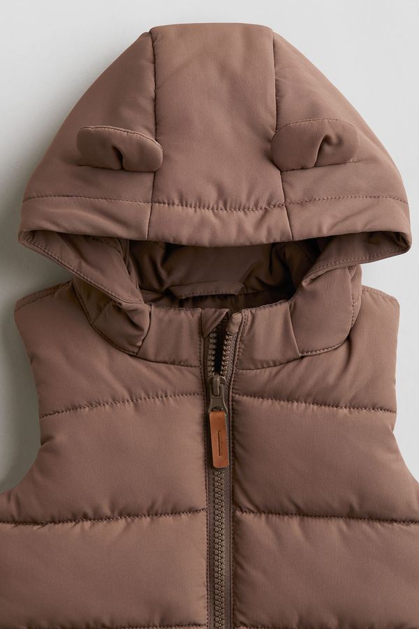 Parka sin mangas con capucha