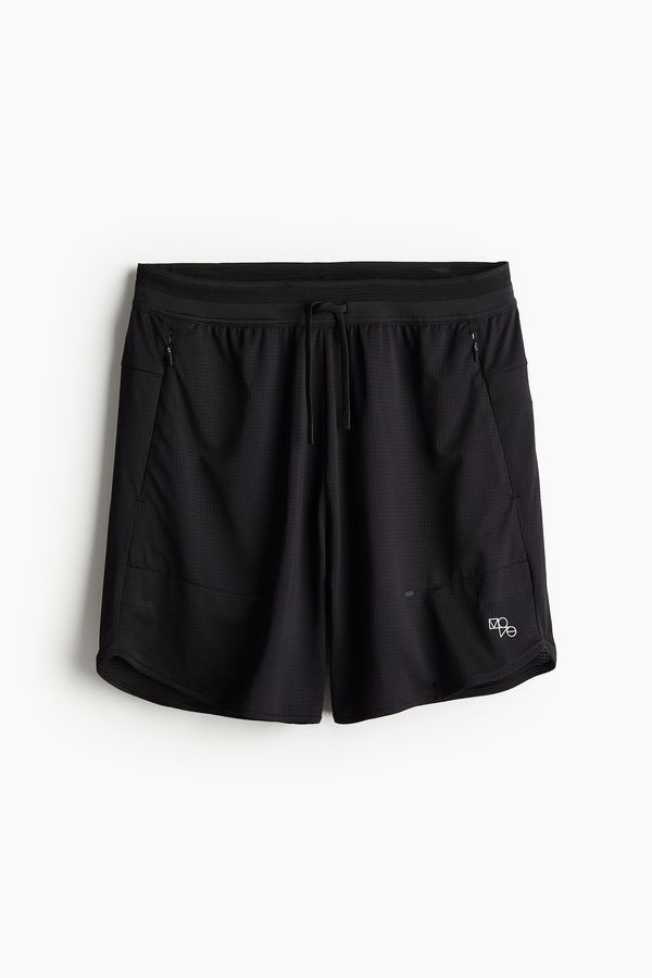 Shorts deportivo a media pierna en DryMove™