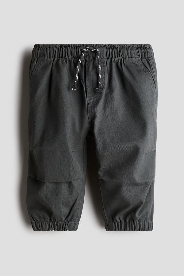 Joggers en sarga de algodón
