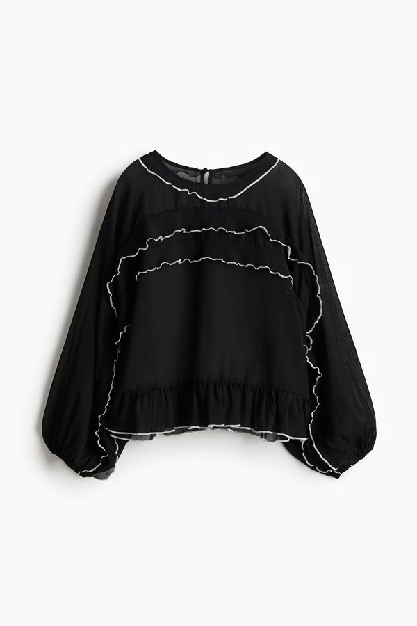 Blusa de gasa con vuelos