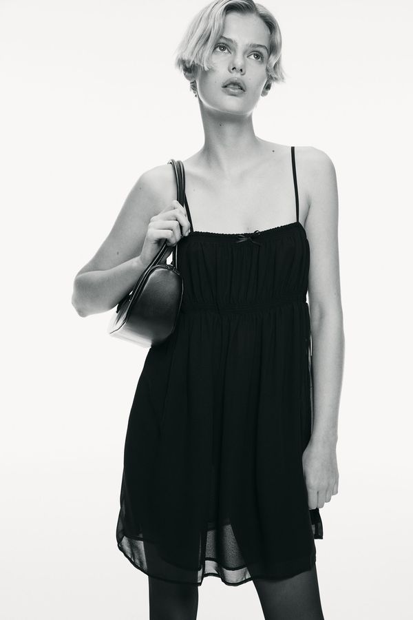 Vestido transparente con tirantes espagueti