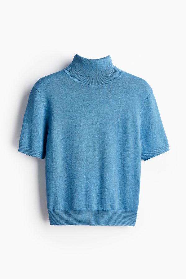 Top de cuello beatle en punto fino