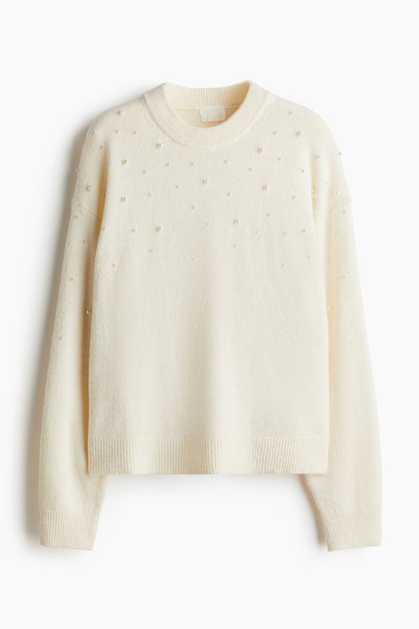 Sweater con detalles decorativos