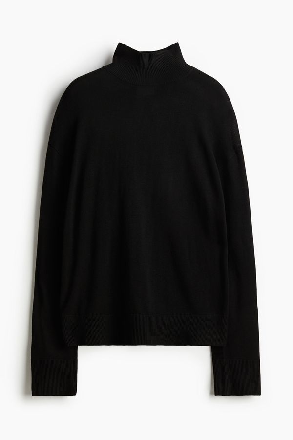 Sweater de punto fino con cuello alto