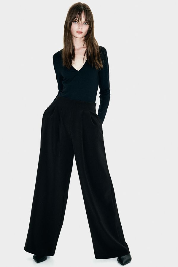 Pantalón amplio