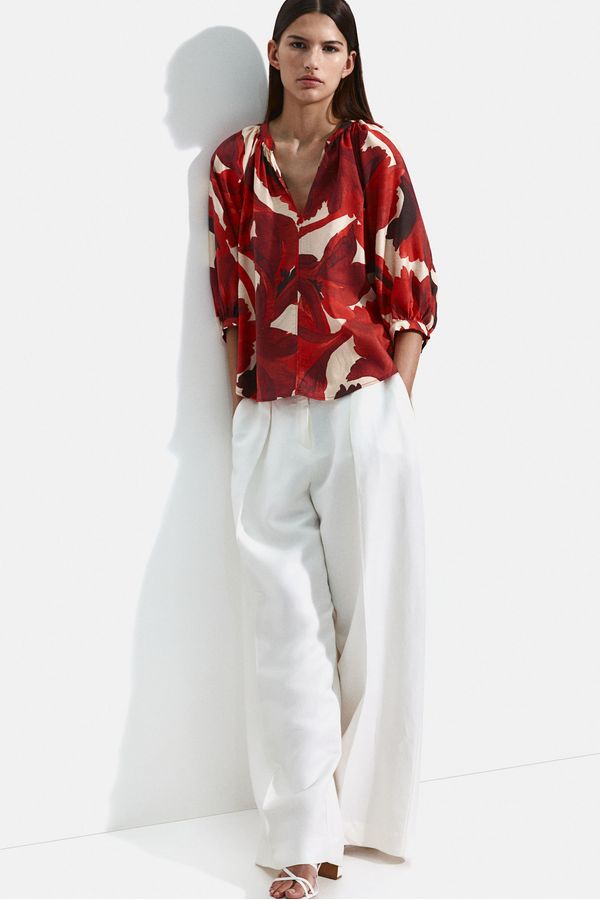 Blusa con mangas globo