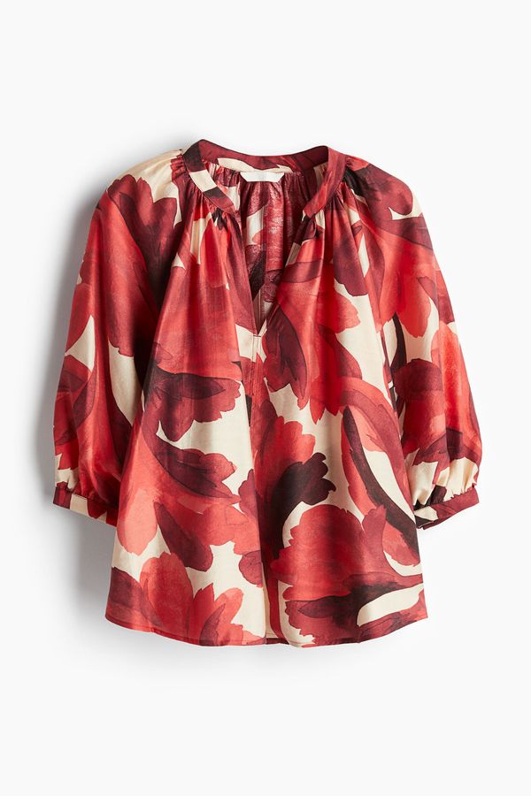 Blusa con mangas globo