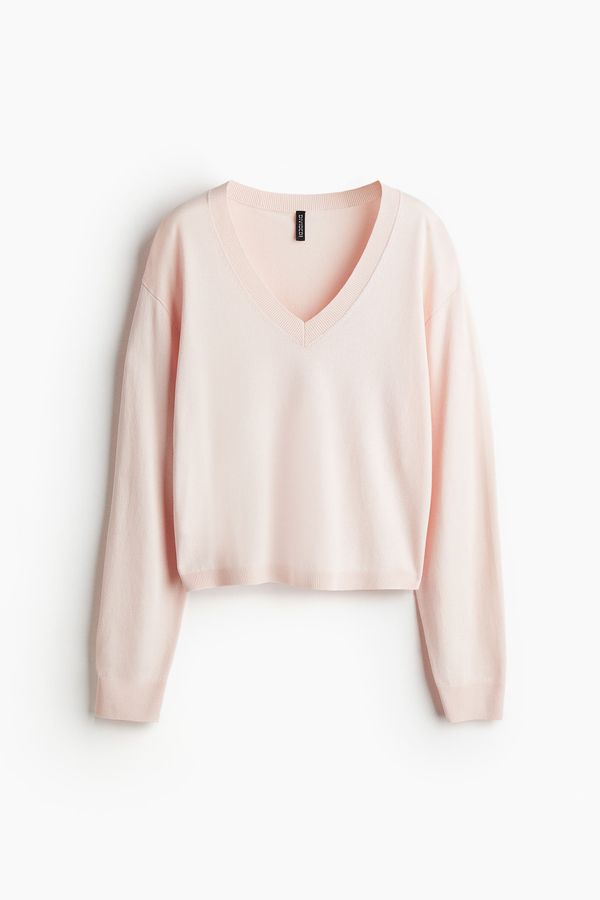 Sweater en punto fino con escote en V
