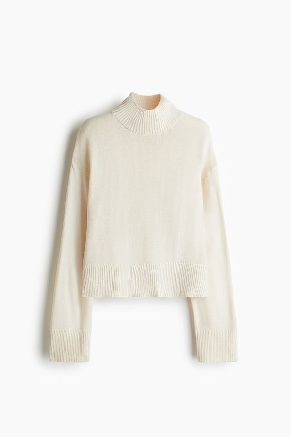 Sweater de punto fino con cuello alto