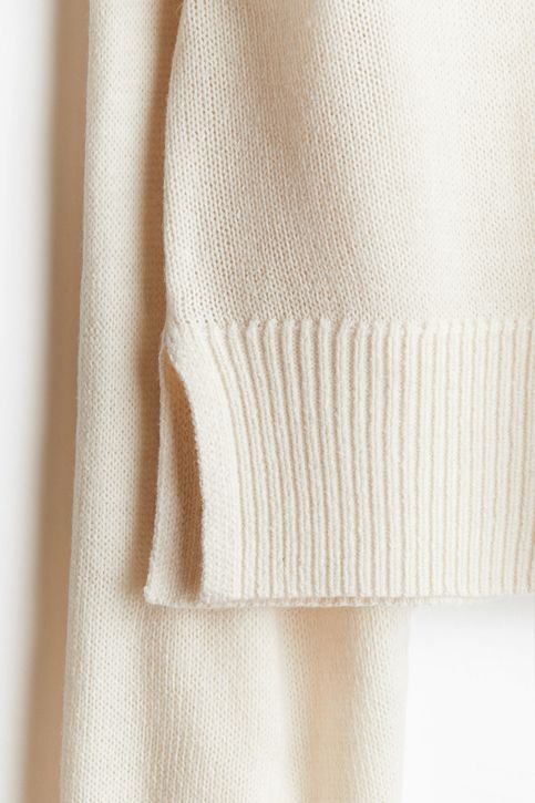 Sweater de punto fino con cuello alto