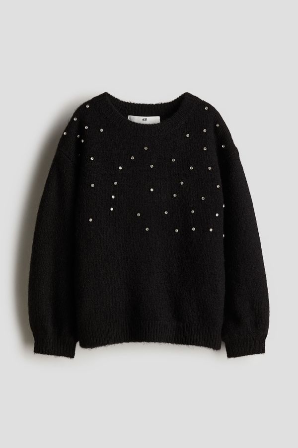 Sweater con detalles decorativos
