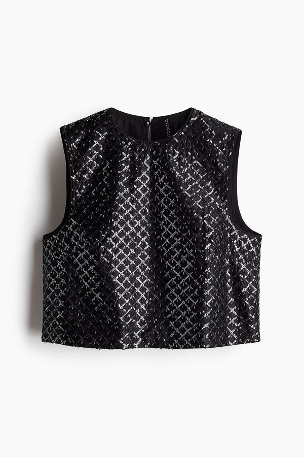 Top con detalles decorativos