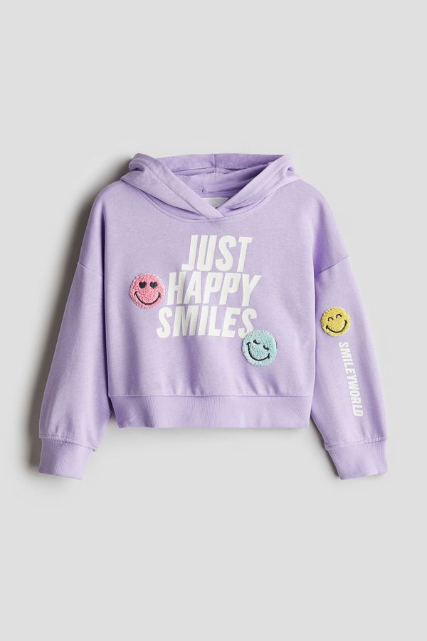 Polerón hoodie con motivo estampado