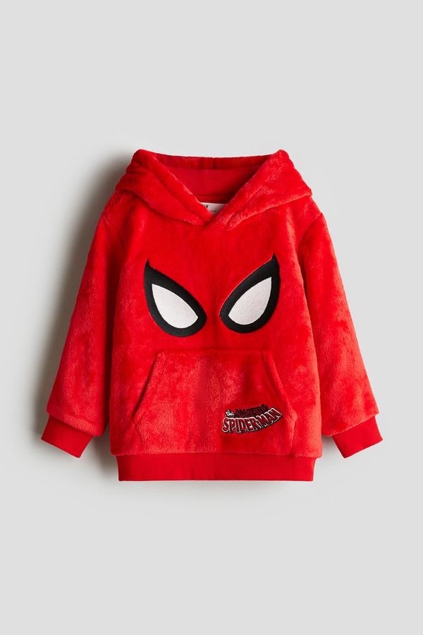 Polerón hoodie en peluche y motivo estampado