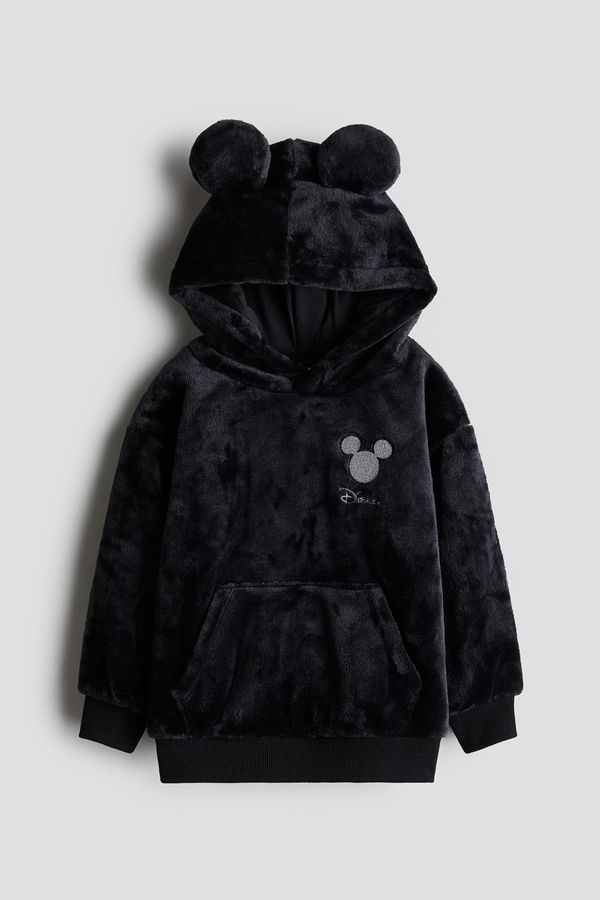Polerón hoodie en peluche y motivo estampado