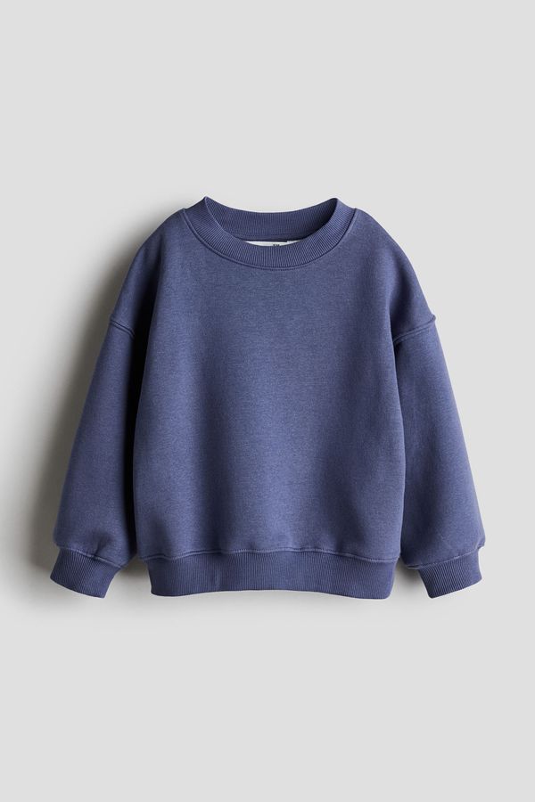 Polerón oversize con cuello redondo