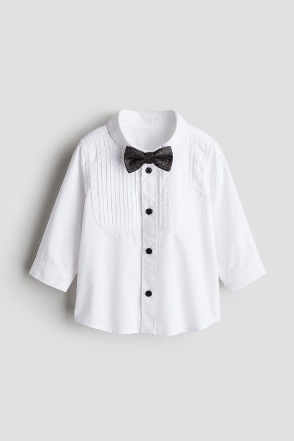 Camisa de esmoquin y humita