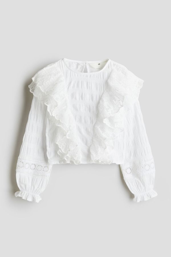 Blusa con vuelos de encaje