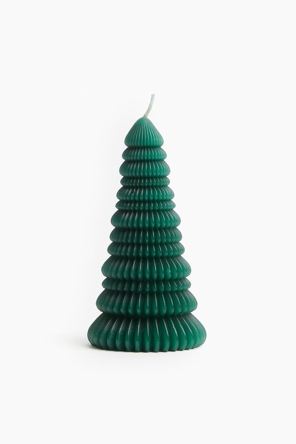 Small fir-tree-shaped candle