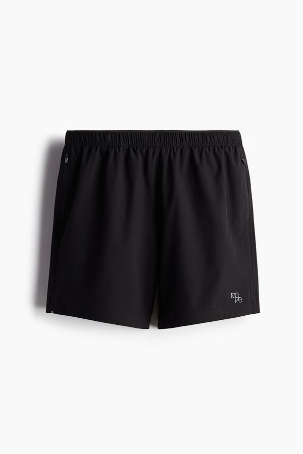 Shorts de running a media pierna