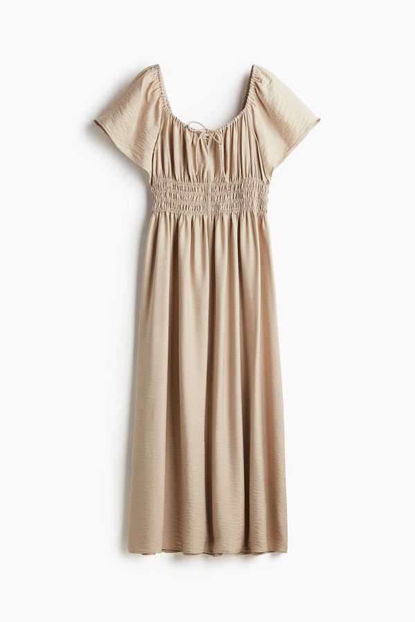 Vestido con mangas mariposa
