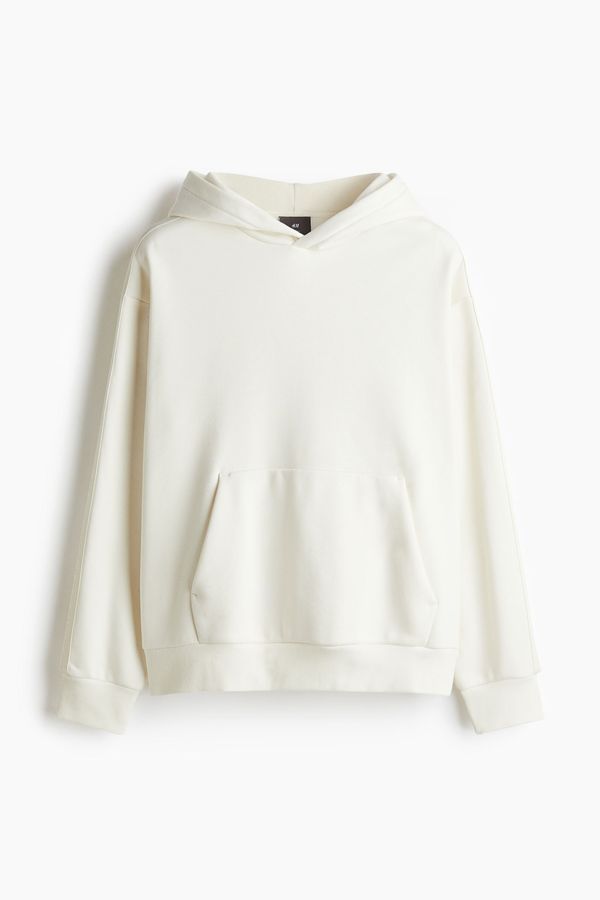 Polerón hoodie con franjas laterales Loose Fit