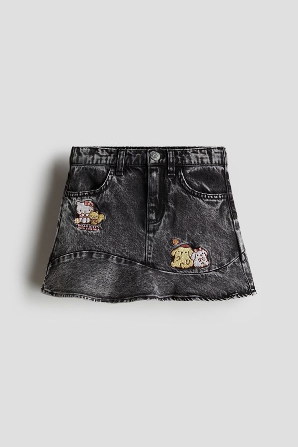 Falda denim con aplicaciones
