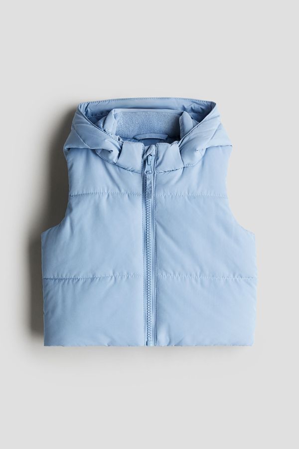Parka puffy sin mangas con capucha