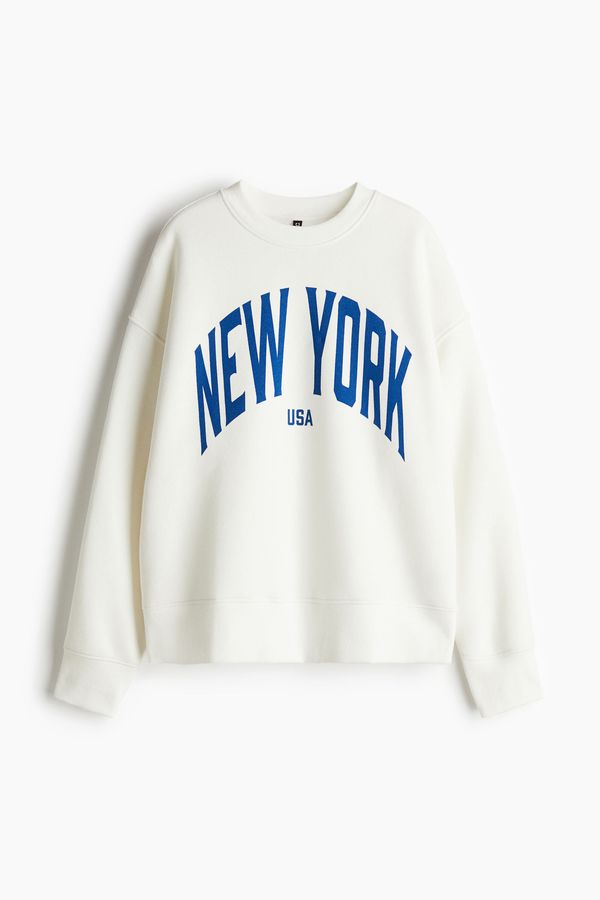 Polerón oversize con motivo estampado