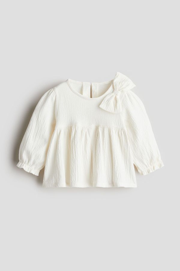Blusa con lazo