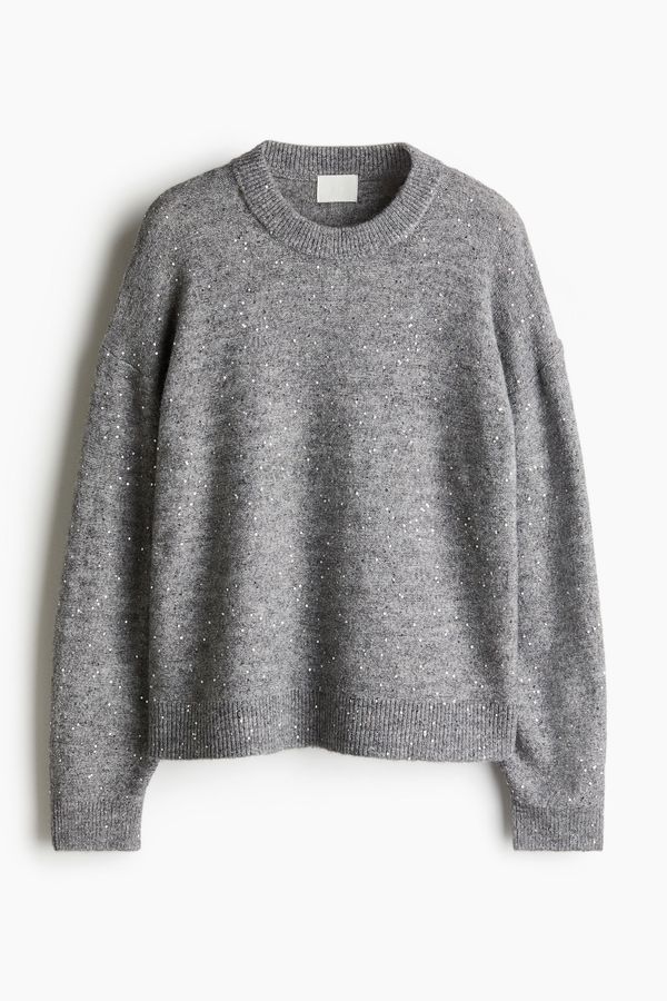 Sweater con detalles decorativos