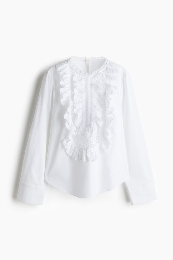 Blusa de algodón con pechera de vuelos